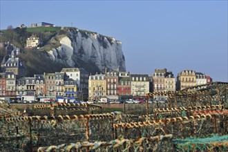 Lobster traps and view over the town Le Treport
