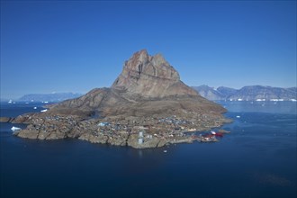 Uummannaq village with colourful houses in front of Heart Mountain