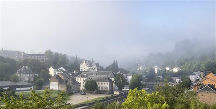 Early morning mist rising over the city Bouillon