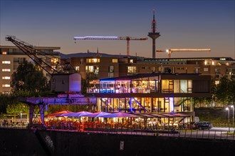 The lights of the Ooosten restaurant in Frankfurt's Osthafen area