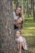 Blonde woman with two girls