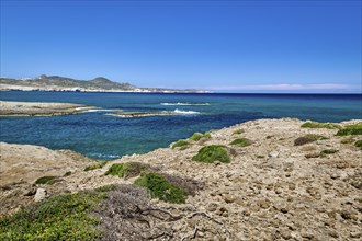 Typical beautiful view of Greek island landscape on sunny summer day. Great blue sky and clouds