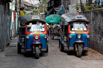 Tuk Tuk Taxis in old alley