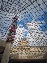 Underneath the Louvre glass pyramid