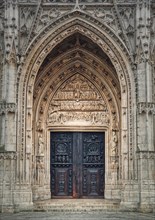 Saint Maclou Church entrance door