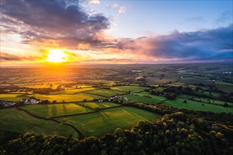 Sunset over Fields and Farms from a drone