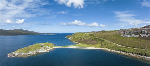 Aerial panorama of the Ard Neaki peninsula in the sea loch of Loch Eribol with the abandoned lime kilns and ferry house