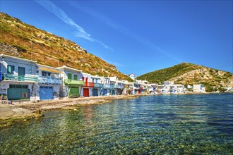 Colorful village of Klima with Greek whitewashed houses on sunny day