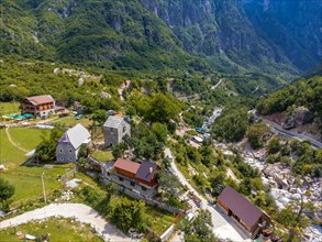 Aerial view over Nikoll Koceku tower in the valley of Theth national park