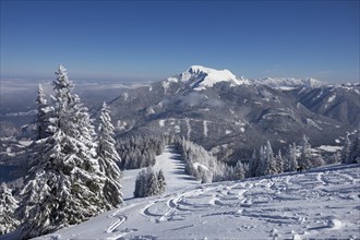 Winter landscape with ski tracks in deep snow