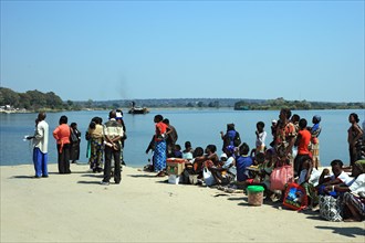 People on the Zambezi River waiting for the ferry