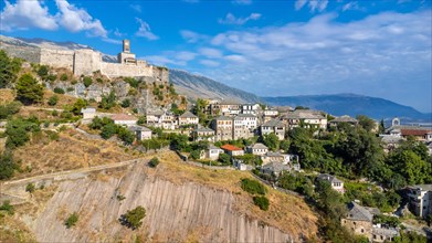 Aerial drone view of the old castle and fortress of the city of Gjirokaster or gjirokastra