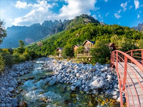 Red bridge along the river of Valbona Valley
