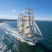 Aerial view modern multi-masted cruise sailing ship