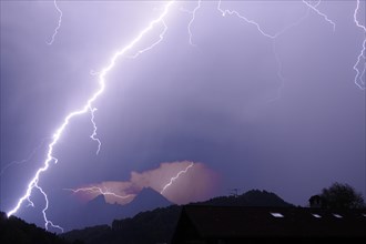 Lightning during a violent thunderstorm over Berchtesgaden with the prominent Watzmann