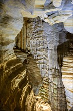 Interior of a deep cave with its columns and rock formations in Lagoa Santa in the state of Minas Gerais