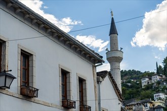 Street from the restaurant and souvenir area to the city of Gjirokaster or Gjirokastra. Albanian