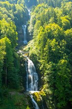The Giessbach Waterfall in Long Exposure on the Mountain Side in a Sunny Summer Day in Brienz