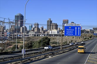 M1 motorway in front of the Johannesburg skyline