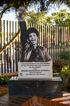 Picture of Winnie Mandel in front of Mandela House