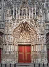 Notre Dame de Rouen Cathedral entrance door. Architectural landmark facade details featuring styles from Early Gothic to late Flamboyant and Renaissance architecture