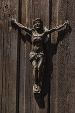 Jesus figure on a wooden door