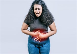 Young woman suffering stomach pain. People with stomach pain isolated