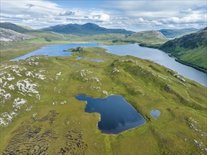 Aerial view of the freshwater loch Loch Stack with surrounding boggy pools in the Northern Highlands