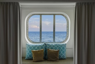 View through the cabin window of a cruise ship