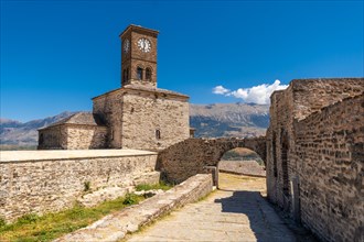The clock tower in the Ottoman castle fortress of Gjirokaster or Gjirokastra. Albania
