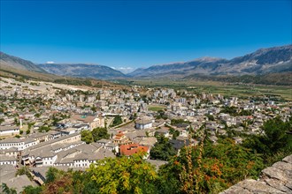 The city from the viewpoint of the Ottoman castle fortress of Gjirokaster or Gjirokastra. Albanian