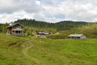 Alpine huts and the New Traunstein mountain hut of the German Alpine Club on the horse-rider Alm