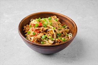 Udon noodle with pork and mushrooms in sweet chilli sauce