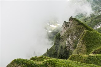 Steep mountains and clouds