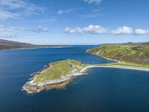 Aerial view of the Ard Neaki peninsula in the sea loch of Loch Eribol with the abandoned lime kilns and ferry house