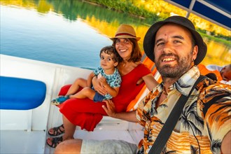 Selfie a family on a boat on a sightseeing excursion on Lake Shkoder in Shiroka. Albania