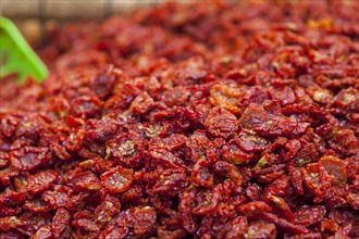 Market stall with dried tomatoes