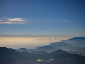 View over the mountains of the south coast at full moon night