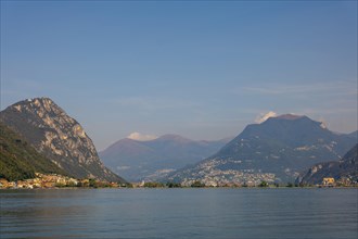 Mountain and City and Lake Lugano in a Sunny Summer Day in Lugano