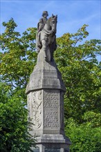 War memorial with equestrian figure