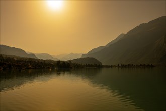 View over Lake Brienz with Mountain and Sunlight in Brienz