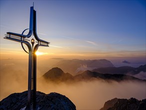 Summit cross Hoher Goell at sunrise