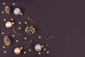 Elegant Christmas flat lay with golden and silver tree ornament baubles