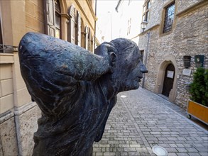 Bronze sculpture The Eavesdropper by Karl-Henning Seemann