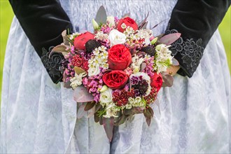 Bridal bouquet with traditional Zillertal traditional costume