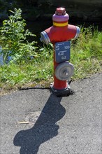 Red hydrant with shadow