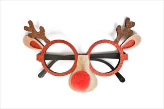 Funny Christmas reindeer eyeglasses on white background