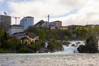 Rhine Falls and Swiss Flag with Industry Building at Neuhausen