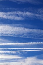 Contrails in the blue sky