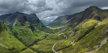 Aerial panorama of Glen Coe with the A82 scenic road